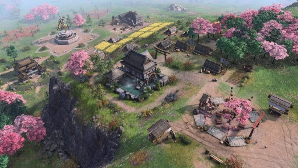 Age of Empires IV llega a PS5: ¿Vale la pena este clásico de estrategia en consola? 5 Gráficos de Age of Empires IV Dinastías del Este mostrando aldea japonesa en PS5