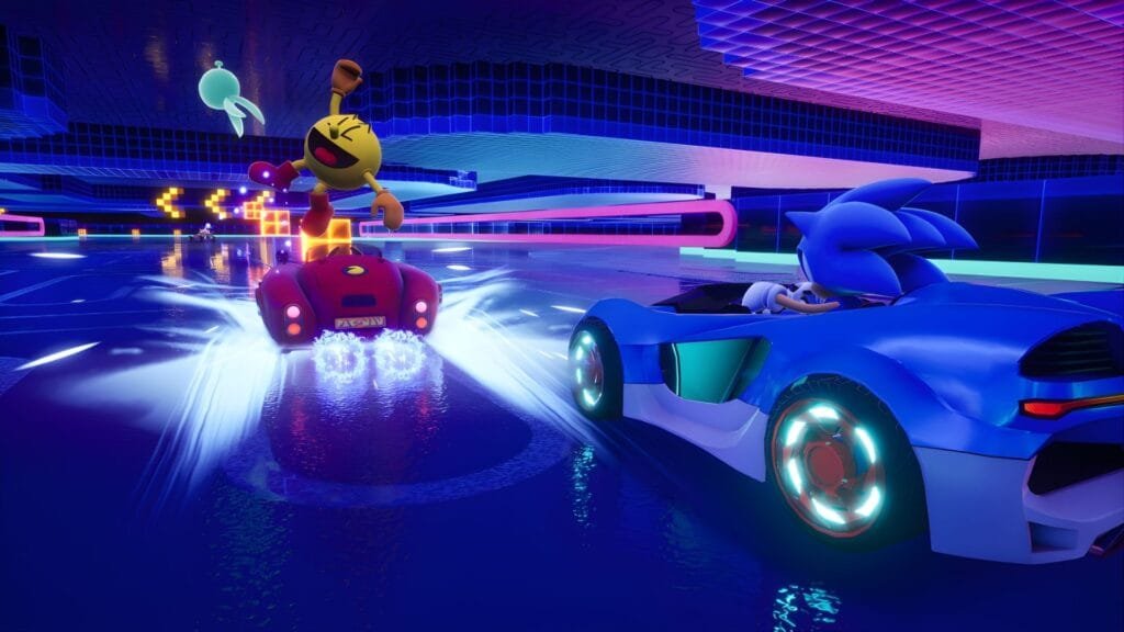 PAC-MAN pilotando su vehículo rojo PAC-MAN Mobile en Sonic Racing CrossWorlds