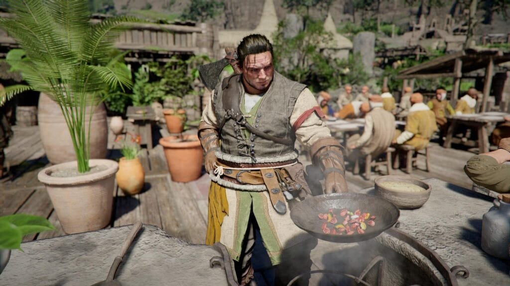 Crimson Desert Charting the Unknown: fecha de lanzamiento, precio y todo lo que trae el primer DLC del juego 2 Personaje de Crimson Desert cocinando en una taberna de Pywel