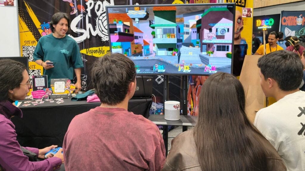 ¿Qué es Ponshot? El juego colombiano de ponchado callejero con parkour que se jugó en SOFA 2026 6 Visitantes juegan Ponshot con mandos en el espacio del BETA TEST FEST de SOFA 2026